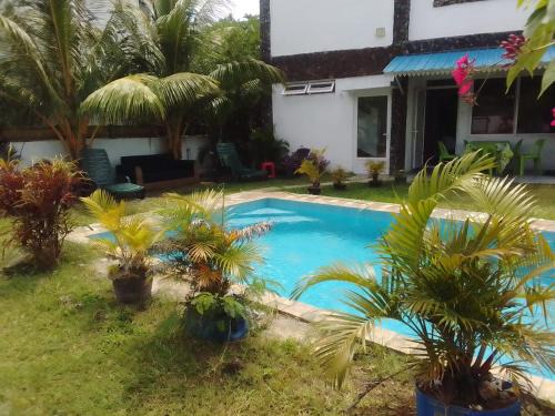 Pointe aux Biches Apartment | First floor apartment with view and balcony and with charming pool near sandy beach and commerces
