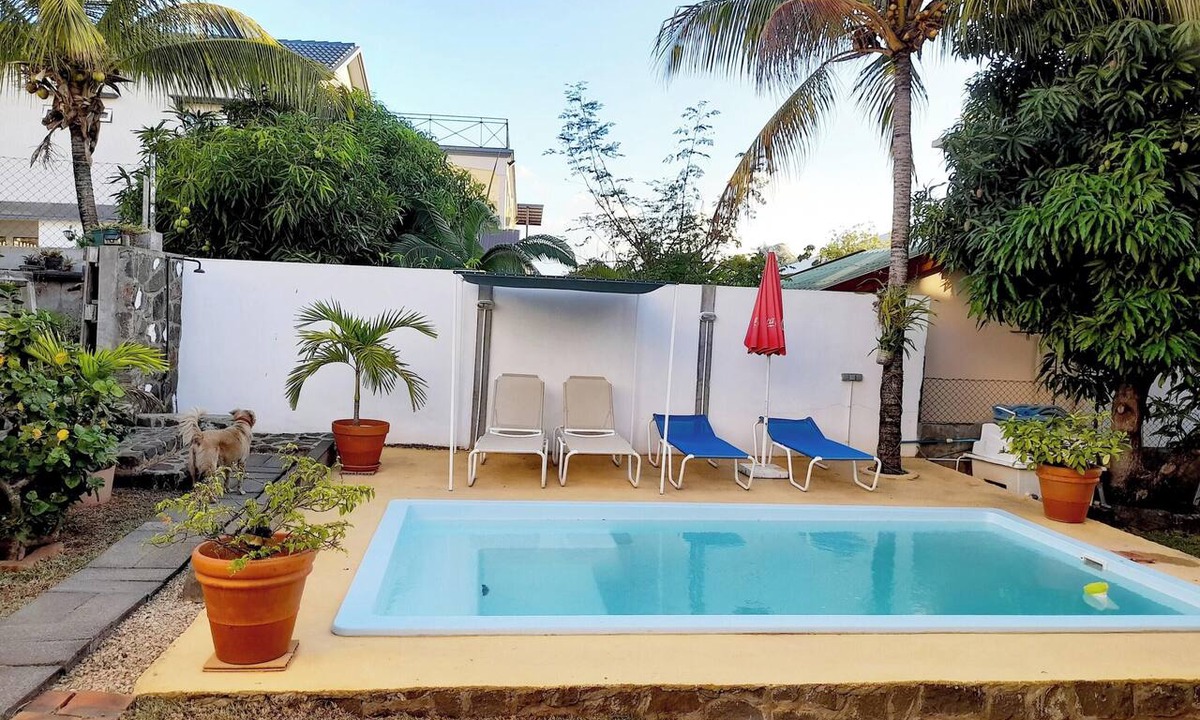 Flic-en-Flac Apartment | Homerez - Apt in Flic en Flac with Pool
