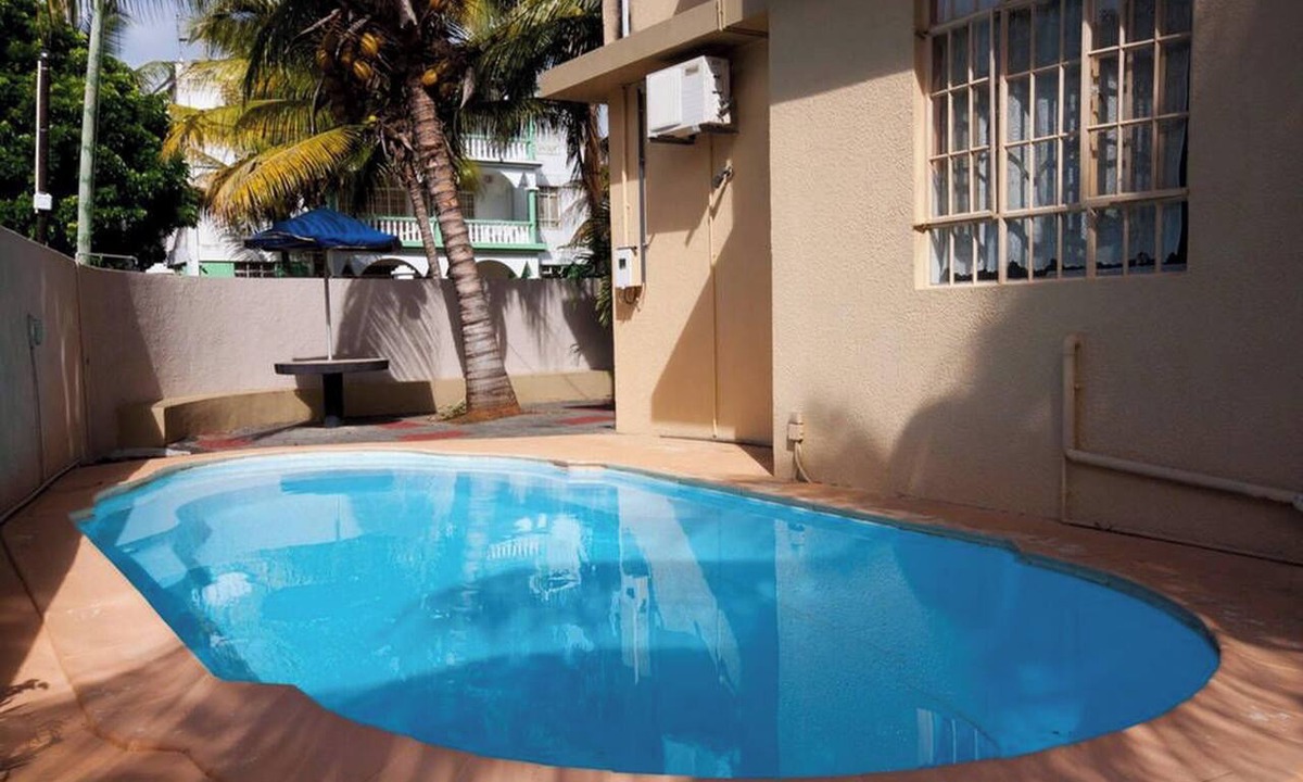 Trou aux Biches Apartment | Homerez - Apt in Trou-aux-Biches with pool
