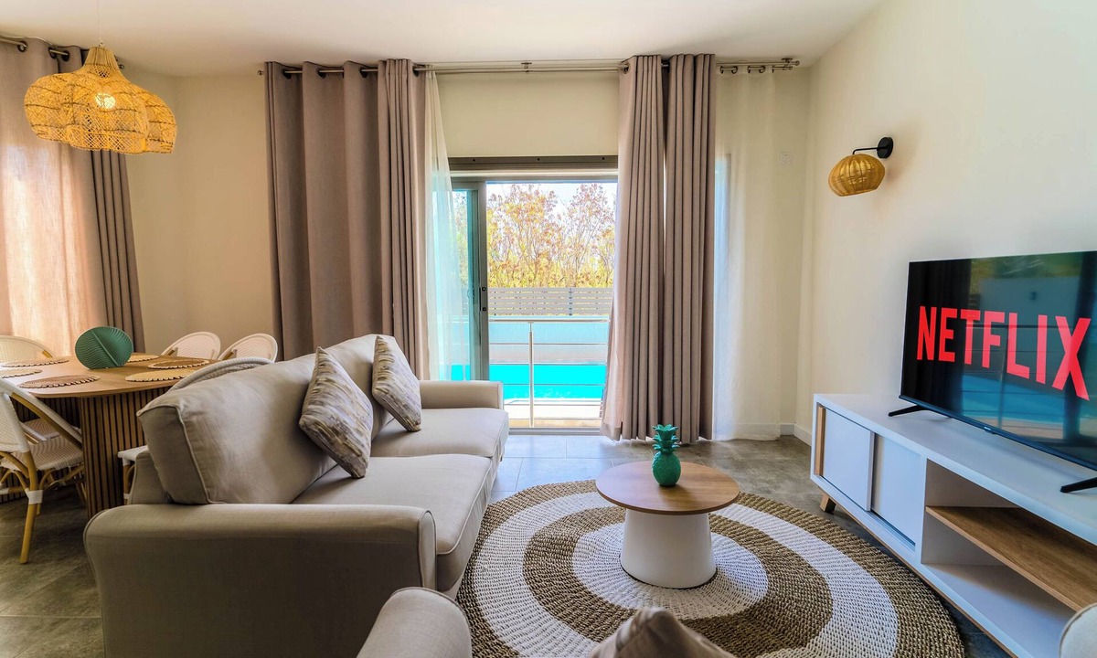 Flic-en-Flac Apartment | Salty Breeze - Fast WiFi, Stylish 3BR Apt with Pool Near Flic en Flac