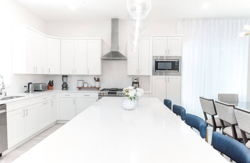 West Bay Condo | 7 Mile Beach Beach Club and Pool Pavilion. Ocean views from Roof Terrace