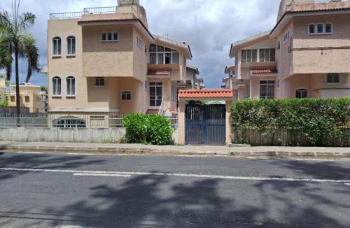 Wolmar Apartment | Beachfront 4-Bedroom Villa with Rooftop Sunset Terrace