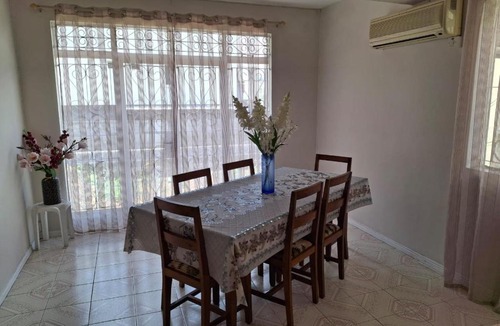 Wolmar Apartment | Beachfront 4-Bedroom Villa with Rooftop Sunset Terrace