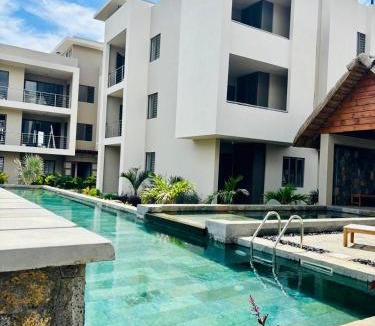 Flic-en-Flac Apartment | Bluerock Residences Luxury 3 bedroom and private rooftop oasis including private jacuzzi with sea and mountain views