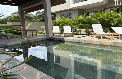 Flic-en-Flac Apartment | Bluerock Residences Luxury 3 bedroom and private rooftop oasis including private jacuzzi with sea and mountain views