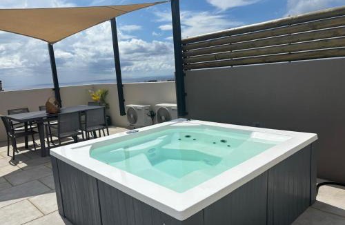 Flic-en-Flac Apartment | Bluerock Residences Luxury 3 bedroom and private rooftop oasis including private jacuzzi with sea and mountain views