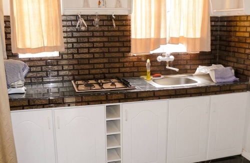 Mont Choisy Apartment | Homerez - Studio in Trou-aux-Biches, garden view.