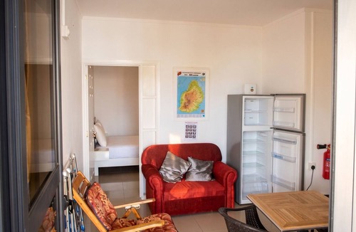 Mont Choisy Apartment | Homerez - Studio in Trou-aux-Biches, garden view.