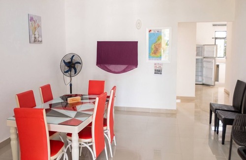 Mont Choisy Apartment | Homerez - Studio in Trou-aux-Biches, garden view.