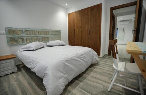 Arrondissement El Bosten Apartment | La touche Bleue