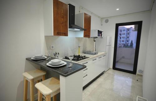 Arrondissement El Bosten Apartment | La touche Bleue