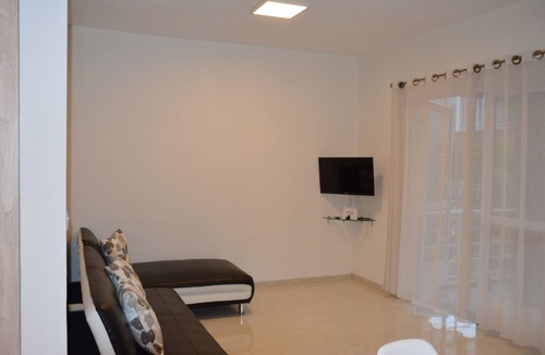Pereybere Apartment | Modern two bedroom apartment located just 100 metres from Pereybere Beach.
