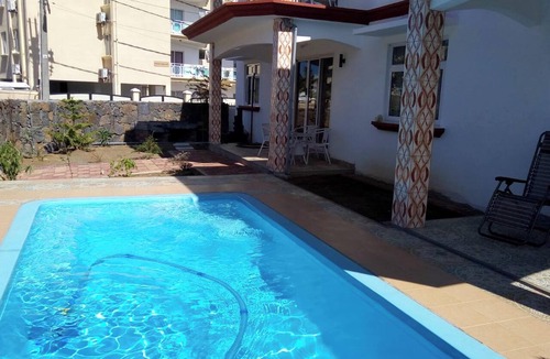 Flic-en-Flac Apartment | Homerez - Elegant Apartment Flic en Flac + Pool