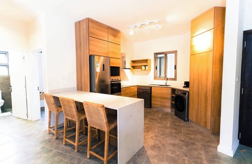 Flic-en-Flac Apartment | Salty Breeze - Fast WiFi, Stylish 3BR Apt with Pool Near Flic en Flac