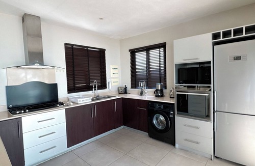 Trou aux Biches Apartment | Seafront 1 bedroom large penthouse apartment on the beach at Pointe Aux Biches.