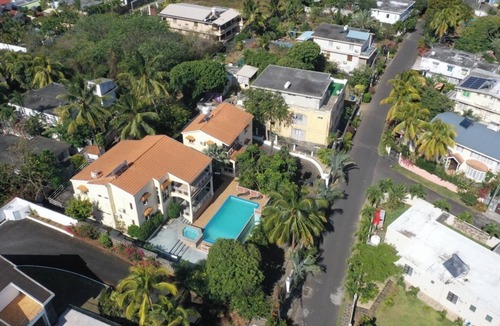 Pointe aux Canonniers House | Tropical villa with a large pool, lush gardens, spacious rooms, and privacy.