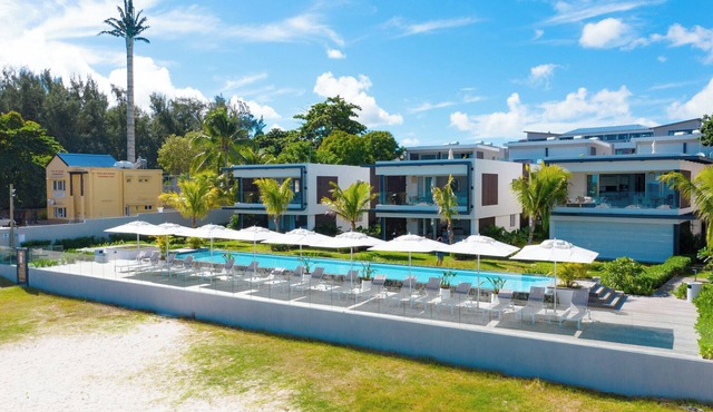 Charming 2-Bedroom Garden Hideaway Steps from Trou-aux-Biches Beach