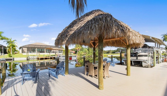 Coral Paradise - 4/2 Gulf Access Home with Electric Heated Pool, Game Room, Kayaks, Tiki Hut in Cape Coral