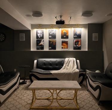 Modern Upper Basement Theatre Suite of Hinton! in Hinton