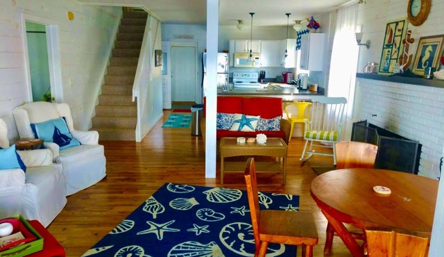 New Listing! Lake front cottage with 100' of private sandy beach in Prudenville