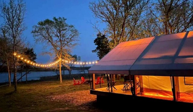 Romantic Lakefront Safari Tent with Fire Pit and Peaceful Views near Bastrop, Texas in Bastrop