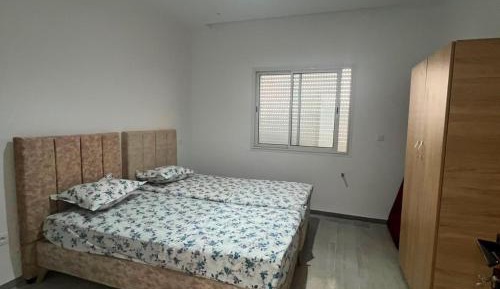 Three-Bedroom Apartment with Balcony