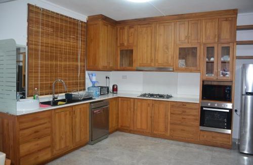 Candos Apartment | U & S Luxury Apartments Ltd